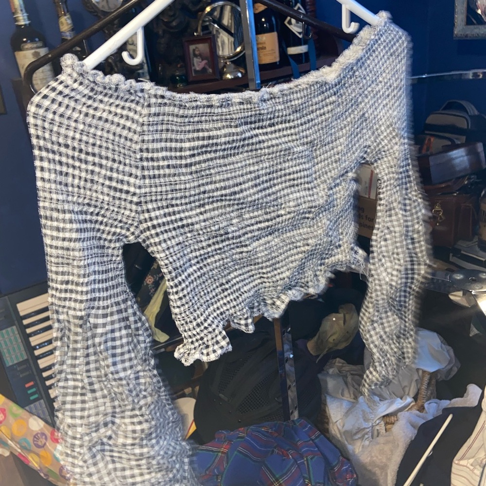 Black and White Off-the-Shoulder Sweater with Cropped Length and Long Sleeves